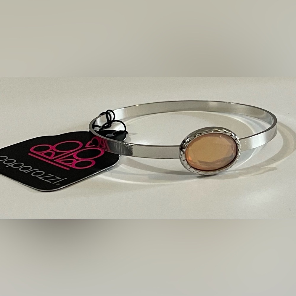NWT Paparazzi Chic Silver Bangle with pink accent stone.